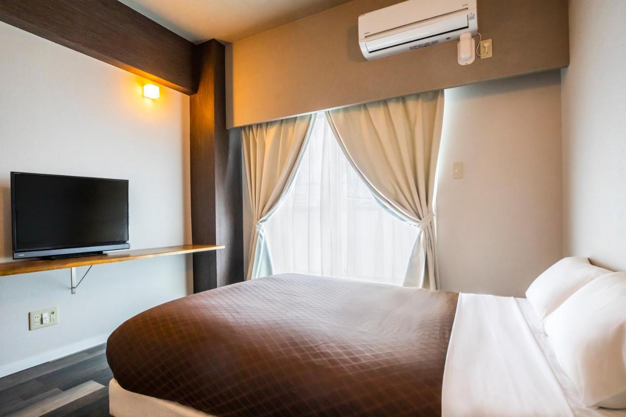 Morimori Land Lejlighedshotel Ginowan Eksteriør billede